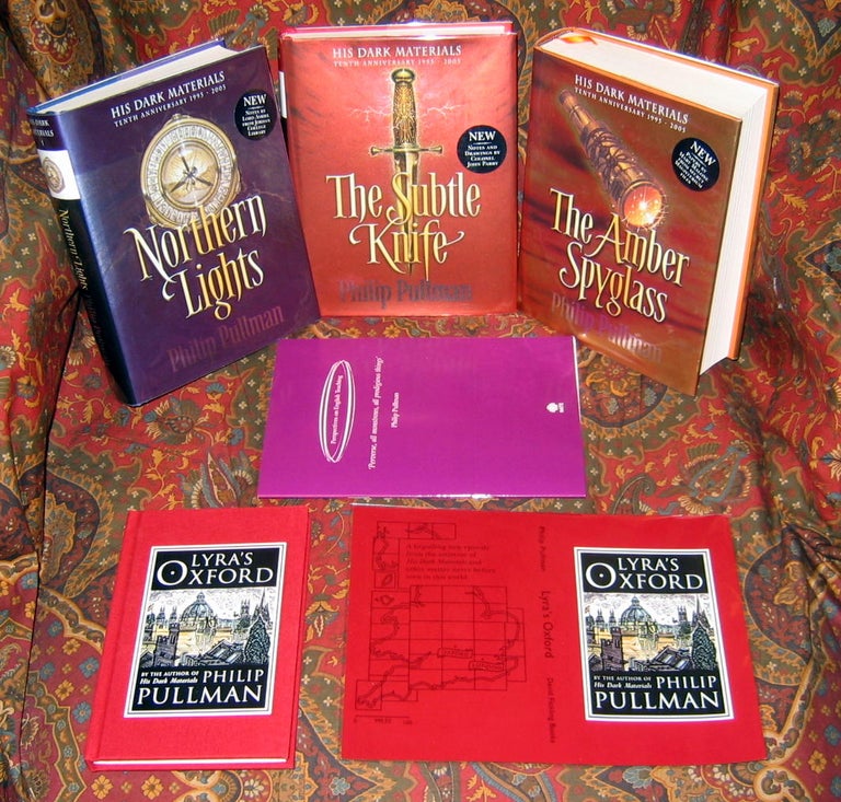 Item #403 His Dark Materials, Comprised of Northern Lights, The Subtle Knife, and The Amber Spyglass. Philip Pullman.