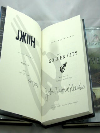 The Fourth Realm Trilogy, Comprised of The Traveler, The Dark River, and The Golden City